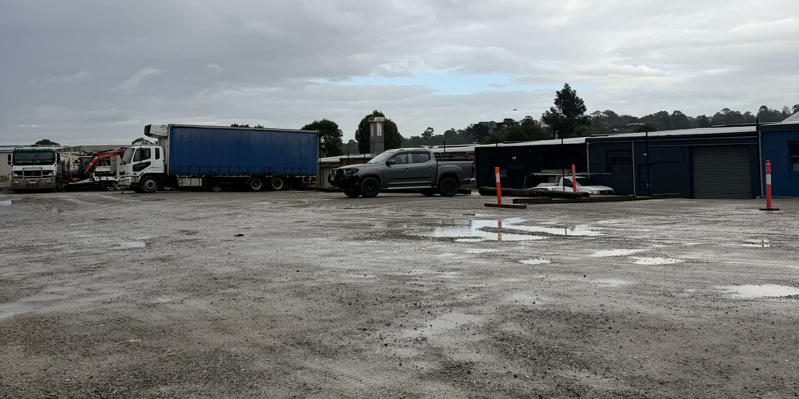 A truck and trailer parked alongside the sheds in our Waldheim Road yard